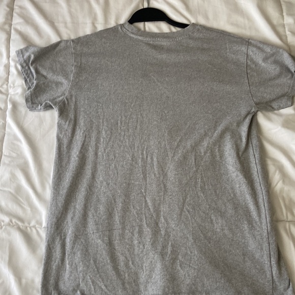 A medium sized gray T-shirt. - Picture 2 of 4